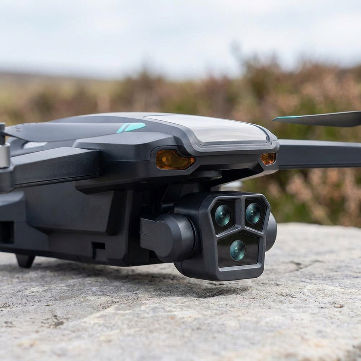 Compact Foldable Camera Drone with Triple Lens and Quadcopter Design for Aerial Photography
