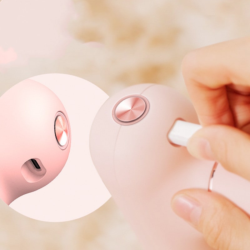 Girls' Mini Handheld Deep Tissue Massage Gun with Four Interchangeable Heads and Portable Cordless Design